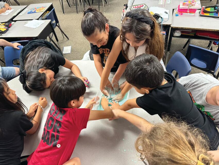 LABELLE -- Upthegrove Elementary School students in AmandaCruz&rsquo;s class made Oobleck  last week. They have been learning about states of matter. Oobleck can have properties of both a solid and liquid. [Photo courtesy Upthegrove Elementary]