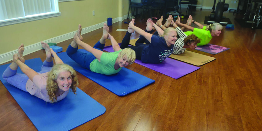 The Yoga practioners pictured are from Shield Wellness Center, Sebring, 4597 Casablanca Circle: Joyce Shafer, Ineta Witmill, Lori Melton, Elizabeth Barrios, and Nancy Petersen demonstrating their body sculpting. [Photo courtesy Nancy Dale)