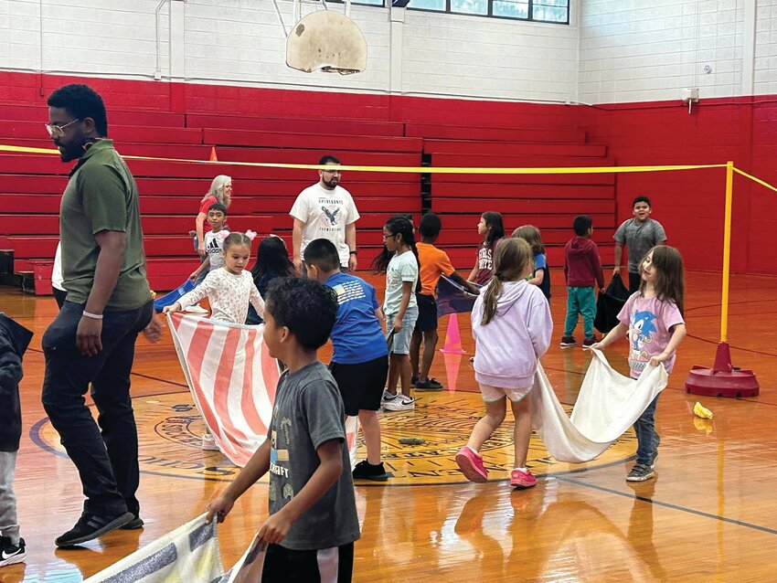 LABELLE -- Sine Upthegrove Elementary School students had a chance to play Chicken Volleyball before Spring Break. [Photo courtesy Upthegrove Elementary School]
