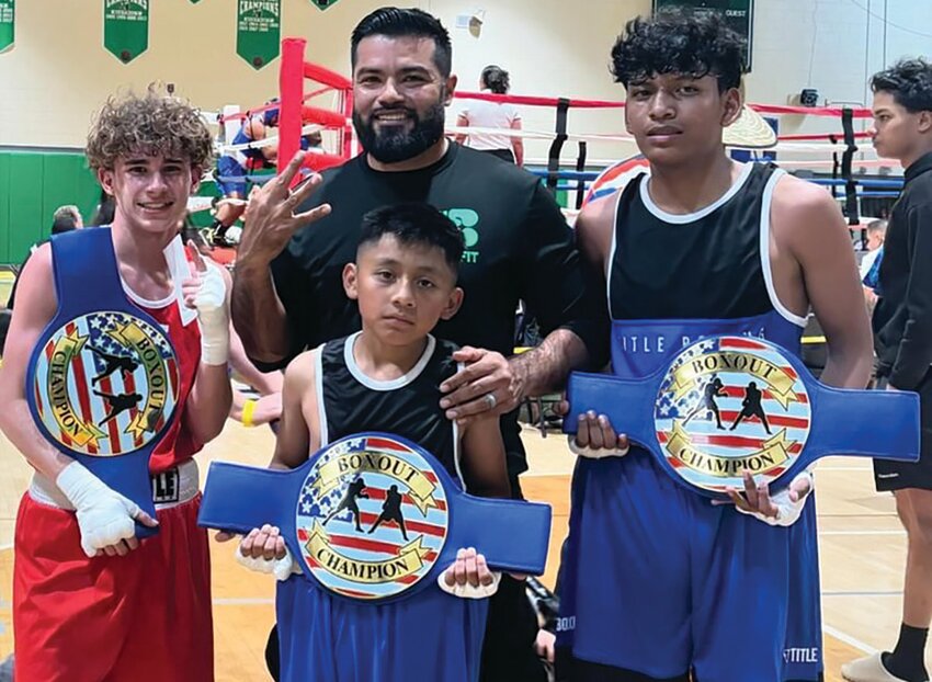 On Saturday, March 23rd, three of our athletes participated in the USA Boxing Lake Placid BOXOFF. Pictured left is Dyllyn Heasley with his 5th consecutive win. Bottom center is Dylan Sanchez Hernandez and top row center is Head Coach Manuel Sanchez. On the right is Jacob Chavez.. All the three athletes secured a unanimous decision win over their opponents and won the BOXOFF Championship belt in their respective divisions. [Courtesy photo]