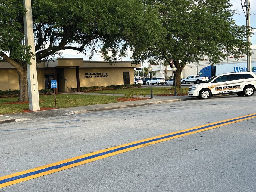Thin blue line in support of law enforcement is back in place in front of the police station..[Photo by Cathy Womble/Lake Okeechobee News]