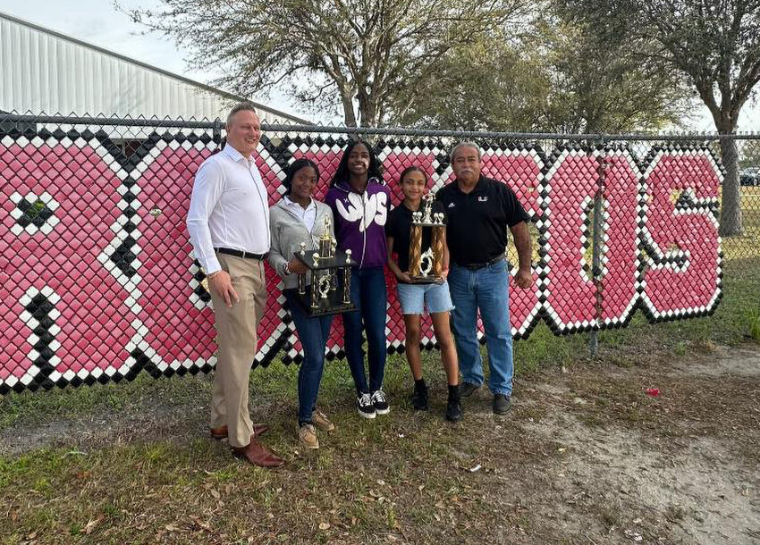 Amari Jackson, Cassie Taylor, and Kamryn Johnson with Coach Jeff Gonzales and Athletic Director Marroquin Sr. [Photo courtesy LaBelle Middle School]