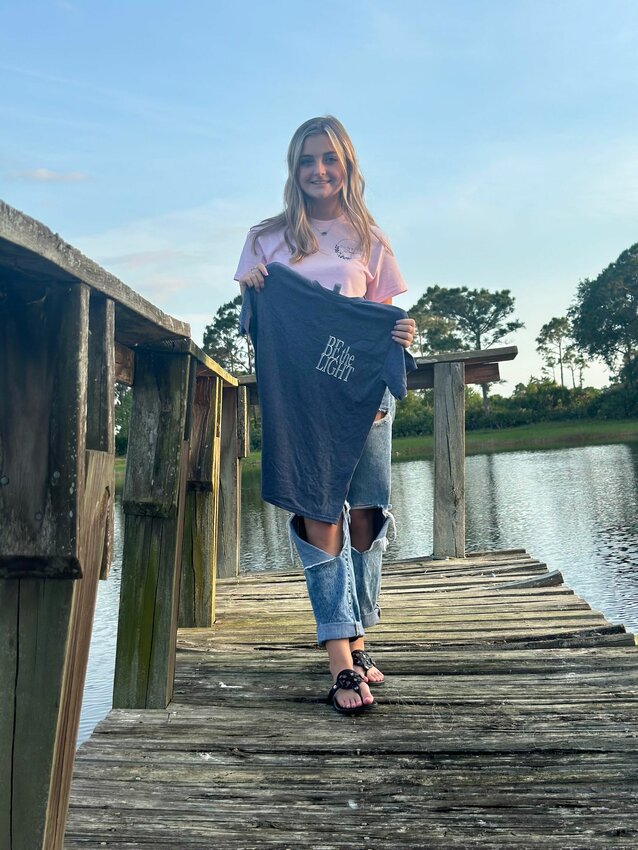 Kali Morse designs and sells t-shirts and other merchandise in her online store, Sunrise Designs.