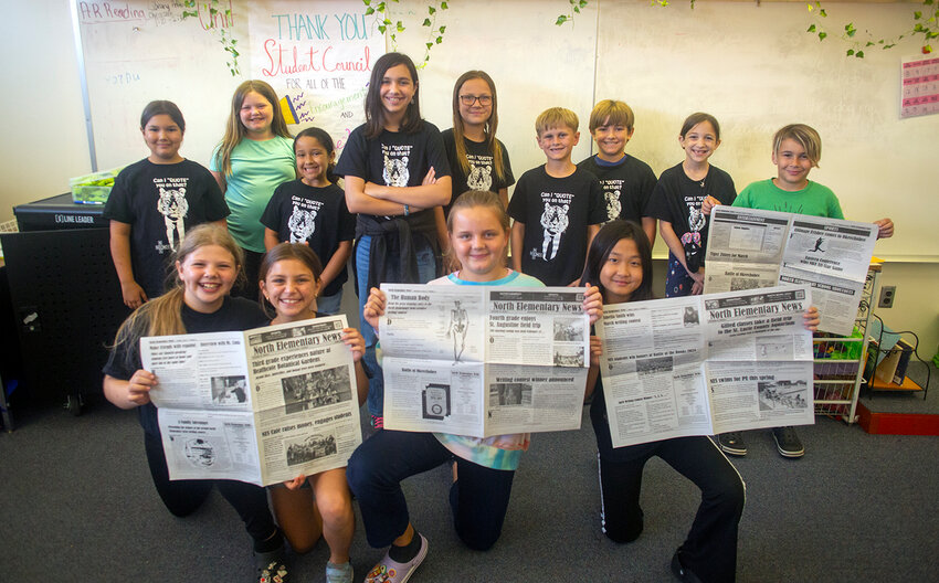 Members of the North Elementary student council with their newspapers. [Photo by Richard Marion/Lake Okeechobee News]