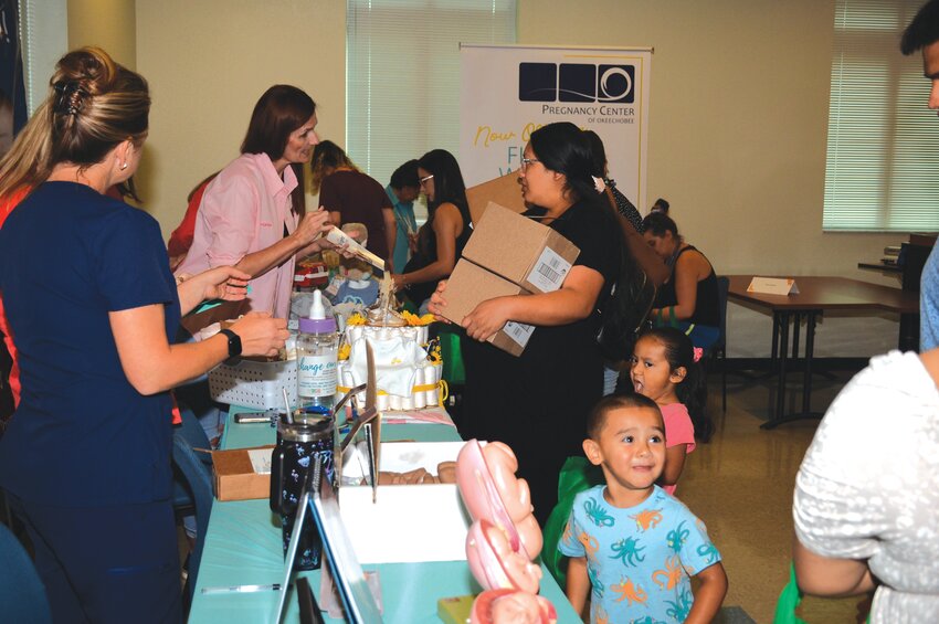 OKEECHOBEE -- Healthy Start's Community Baby Shower attracted more than 100 families on May 17. [Photo by Katrina Elsken/Lake Okeechobee News]