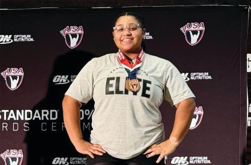 Aleah Baron earned a spot on the winners' podium  at the USA Weightlifting National Championships. (Photo courtesy Cindy Baron/Hendry County News)