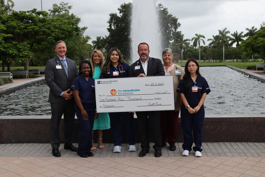 (L to R) Karl Leistikow, CEO, Physicians Regional-Collier Blvd., Makeyla D., Student Intern, Noemi Y. Perez, President and CEO, The Immokalee Foundation, Arianna P., Student Intern, Scott Lowe, Market CEO, Cathy Bartoszek, Director of Clinical Education, Physicians Regional Healthcare System, Lizbeth P., Student Intern