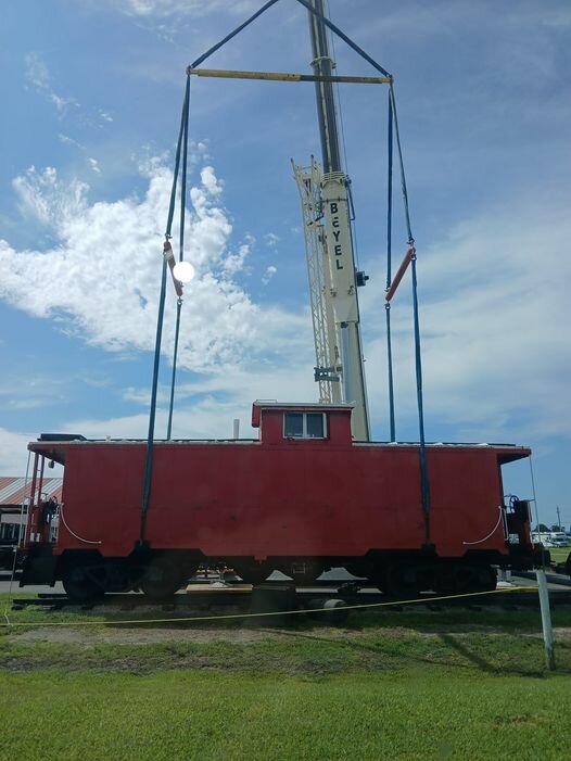 Caboose leaving flea market and heading to South Florida Fairgrounds