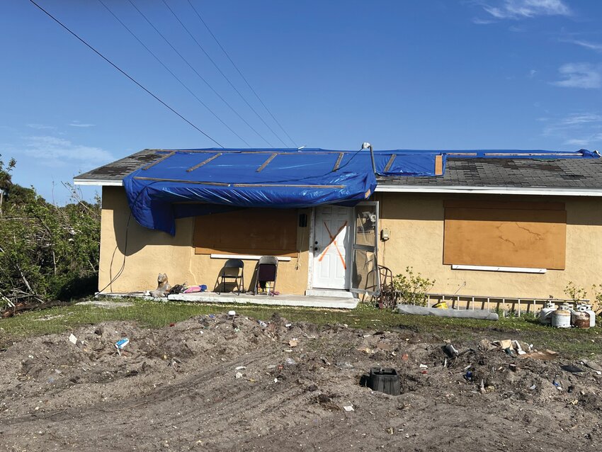 LAKEPORT &ndash; The U.S. Army Corps of Engineers has placed tarps on more than 7,100 homes damaged by Hurricanes Helene and Milton, including some homes in Glades County (pictured here) and Okeechobee County.  If you signed up for the program and have not yet been helped, check the status of your application at https://www.usace.army.mil/Missions/Emergency-Operations/Blue-Roof-Info/..[Photo by Katrina Elsken/Lake Okeechobee News].
