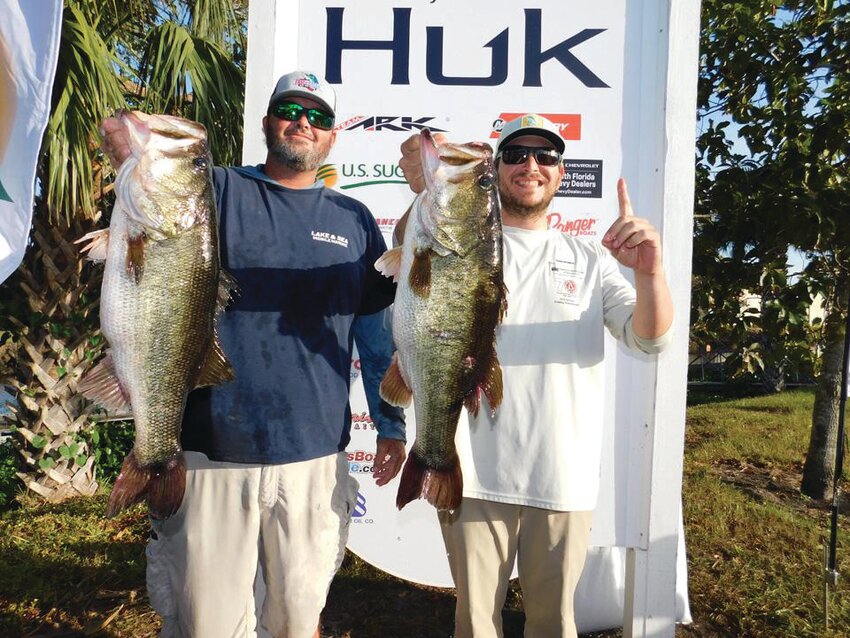 CLEWISTON -- the team of Chris Schirling and Alex Nagdeman had 40,000 reasons to celebrate this holiday season. [Courtesy photo]