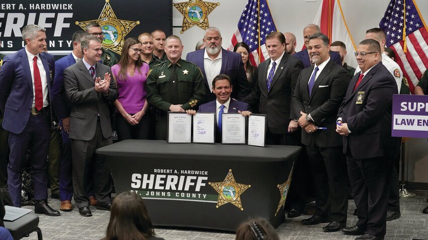 Gov. Ron DeSanits signs Senate Bill 184. [Photo courtesy of the Executive Office of Governor Ron DeSantis]