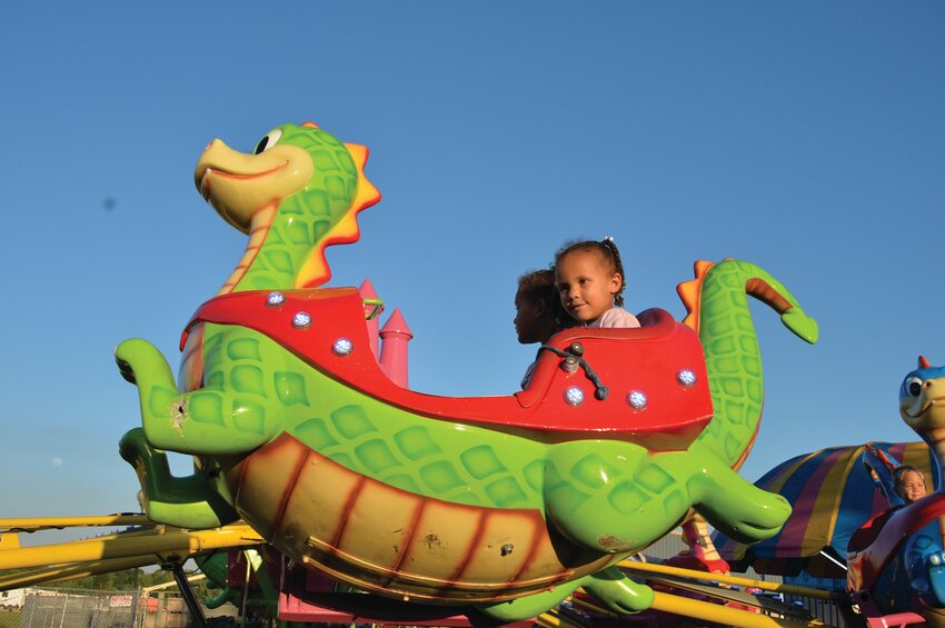 OKEECHOBEE -- Children enjoyed the Okeechobee County Fair Midway rides. [Photo by Katrina Elsken/Lake Okeechobee News]