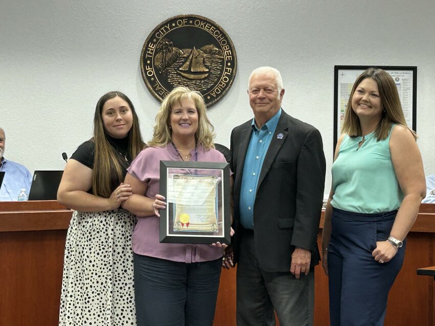 Mayor Dowling Watford proclaimed the week of May 4-10 as Professional Municipal Clerks' Week during the Okeechobee City Council's May 6 meeting. Pictured are Cayetana Ortega, City Clerk Lane Gamiotea, Mayor Watford and Deputy Clerk Katie Rogers.