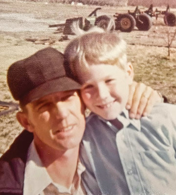 On the farm with Dad in 1974.
