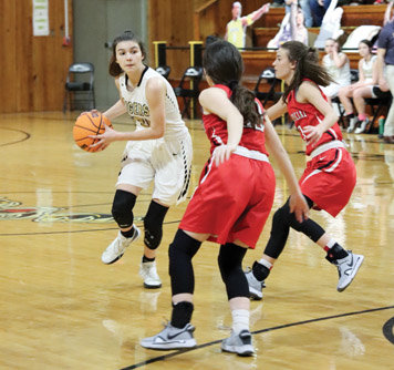 Katie McCoy handles the basketball for Timbo during a game Jan. 21 vs. Rural Special.