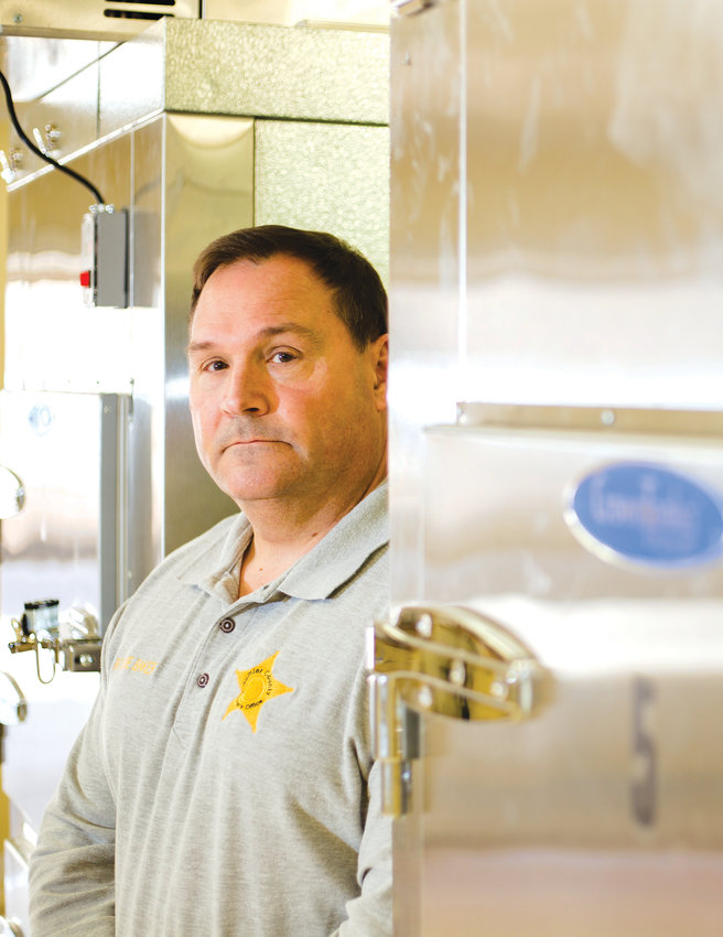 Coroner Robbie Baker stands in the Sumter County morgue in 2019.  He said there have been 16 homicides so far this year, with five involving victims 20 years old or younger.