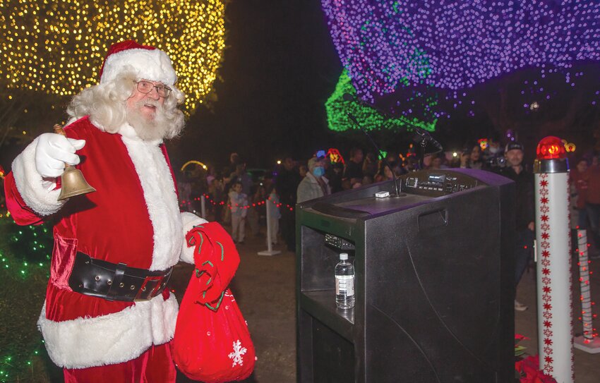 Santa attends the official opening of The Fantasy of Lights at Swan Lake Iris Gardens on Dec. 1, 2021. This year's opening event is Dec. 1 at 6 p.m.