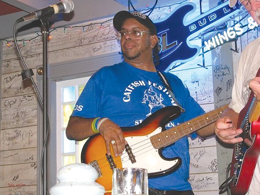 Francis Hanna doubled as sound man for Pizza Lane's Wings and Strings Nights but never strayed too far from his bass.