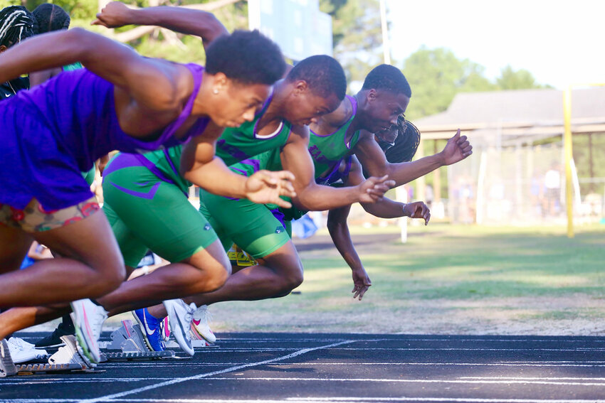 Sprinters take off during the Sumter County Championship on Thursday at Wilson Hall. The event features Sumter High, Lakewood, Crestwood, Wilson Hall and Scott's Branch.