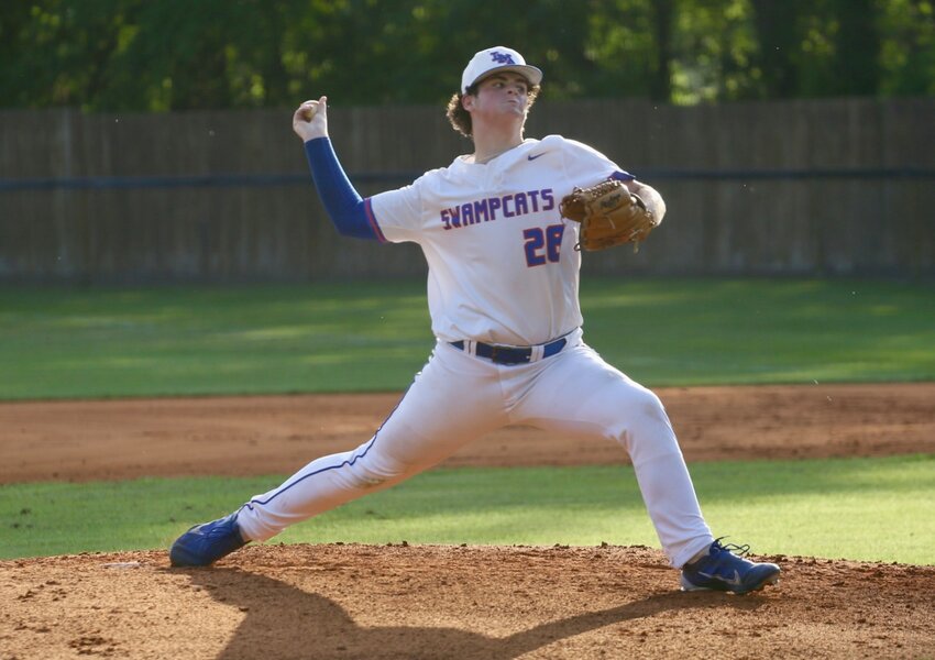 Laurence Manning's Walker Smith delivers a pitch against Porter-Gaud on Wednesday.