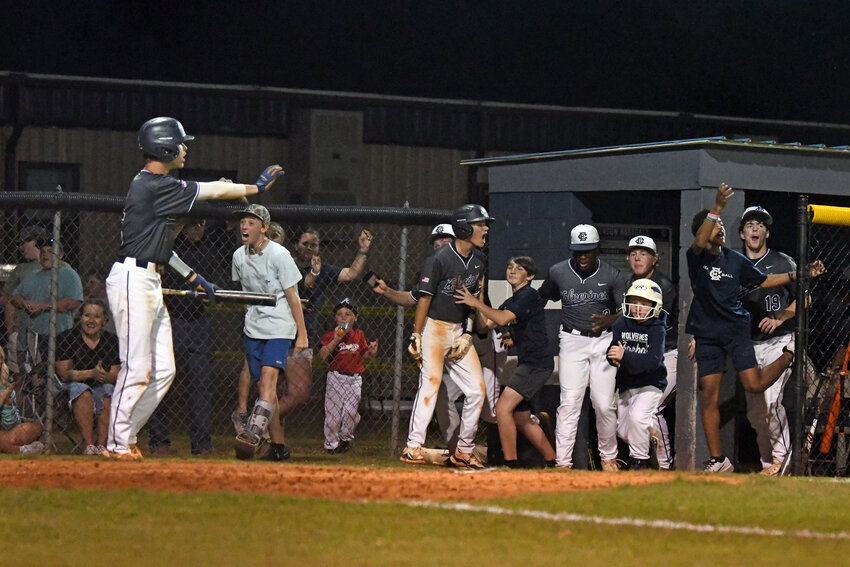 The East Clarendon baseball team celebrates after taking the lead against Hannah-Pamplico on Thursday.