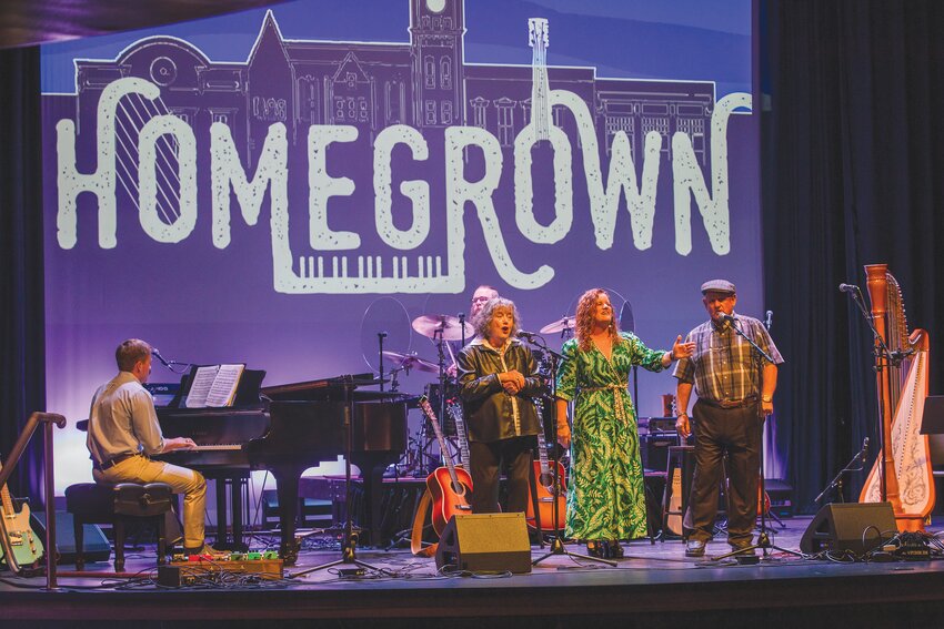 Kipper Ackerman and her parents, Hank and Sandi Edens, sing together on stage at Sumter Opera House on Thursday, May 2, for Homegrown, the annual concert series benefitting The Sounds of Grace, a local musical nonprofit.