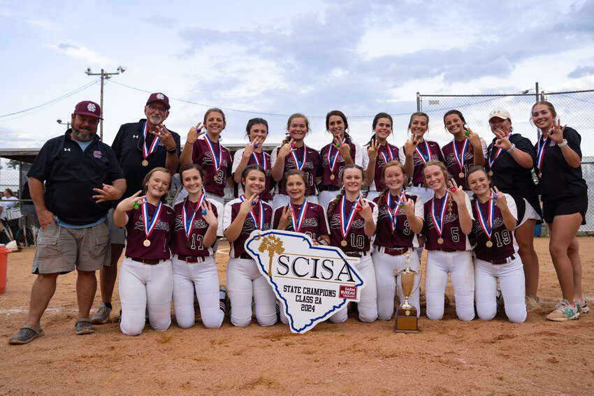 The Clarendon Hall softball team celebrates after beating Colleton Prep 3-2 on Wednesday to win the SCISA 2A state championship.