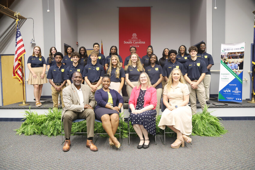 Ross McKenzie Emerging Leaders 2023-24 class graduates on May 15, receiving their embroidered polos before beginning the second half of the program in the fall.