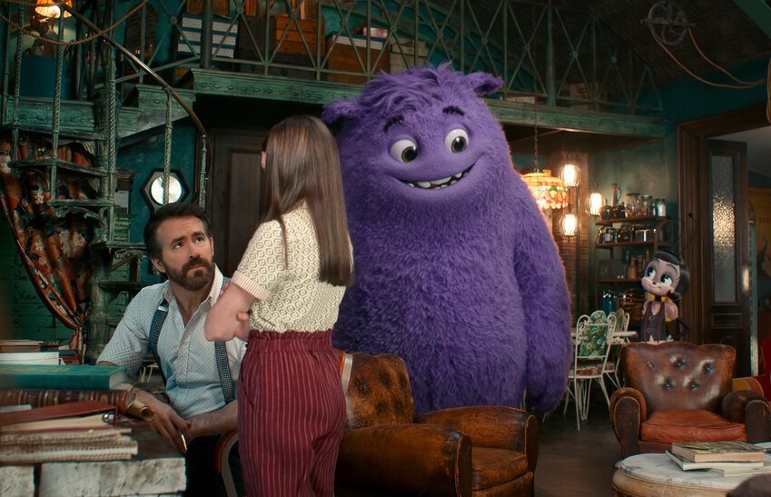 This image released by Paramount Pictures shows Ryan Reynolds, from left, Cailey Fleming, the character Blue, voiced by Steve Carell, and the Blossom, voiced by Phoebe Waller-Bridge, in a scene from &quot;IF.&quot;