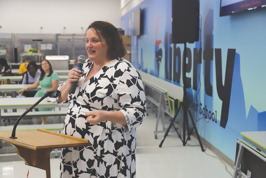 Kelli Carlisle gives a presentation at LIberty STEAM's Board of Directors' meeting last week at its elementary academy campus in Sumter Mall. Next school year, Carlisle will be a &quot;teacherpreneur&quot; for the academy.