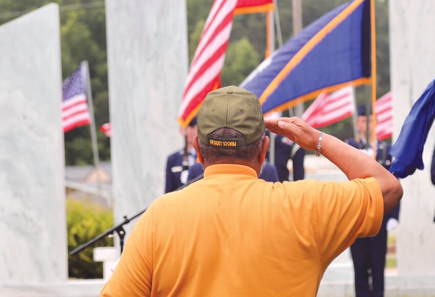 A veteran salutes during the Sumter County Veterans Association's annual Memorial Day Ceremony on Monday, May 27, to remember and honor all who have served the United States at Sumter Veterans Flag Park, on U.S. 76/S.C. 378 to the east of Shaw Air Force Base.