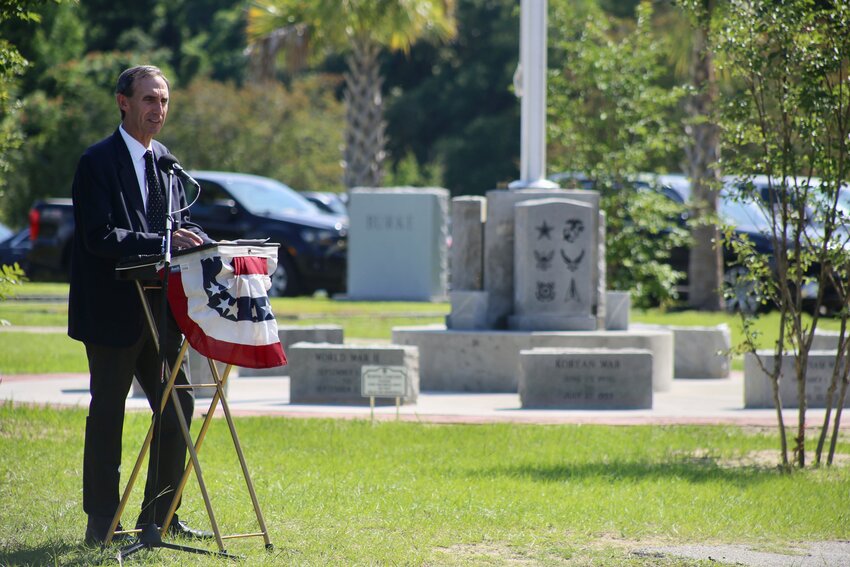 Retired Maj. Gen. Scott Zobrist speaks on Tuesday, May 28, at a dedication ceremony for the new on-site memorial honoring veterans, both local and worldwide, at Sumter Historic Cemetery.