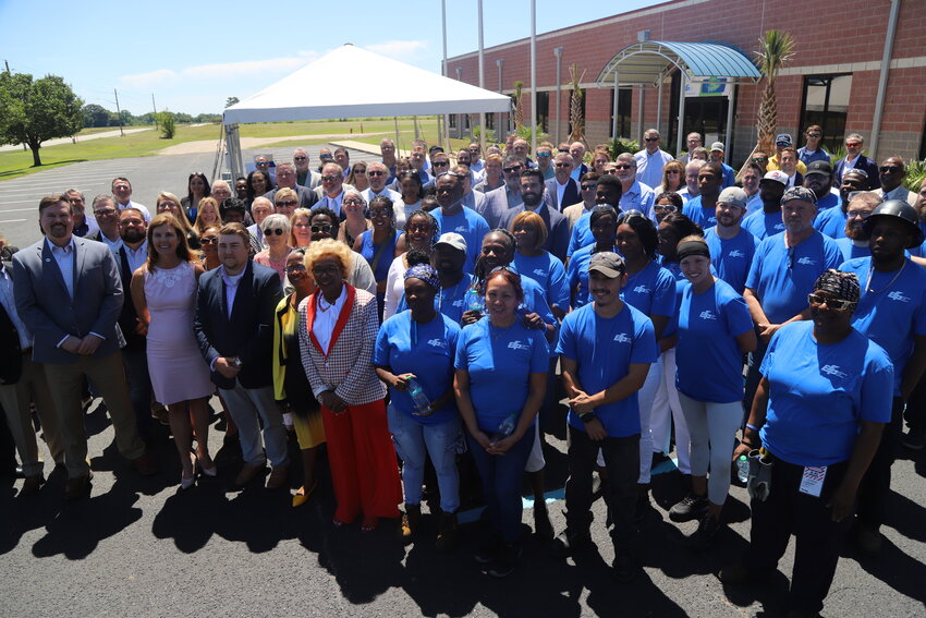 Local and regional dignitaries and EFP employees gathered for a group photo at the conclusion of the grand opening ceremony Thursday.
