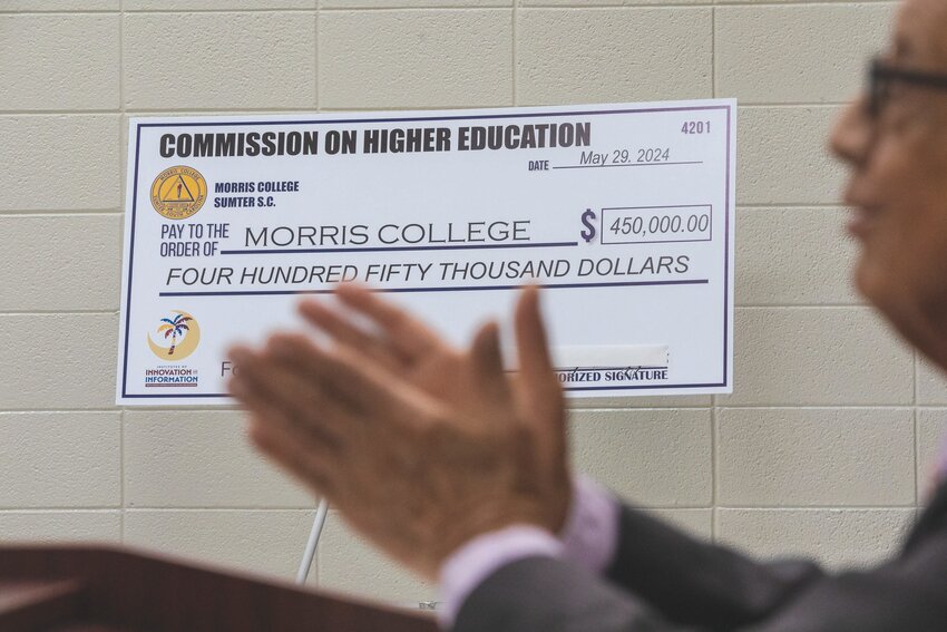 Morris College chairman of Natural Sciences and Mathematics Radman Ali speaks before a check presentation for the cybersecurity program at the school on Thursday, June 12.