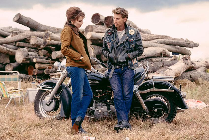This image released by Focus Features shows Jodie Comer, left, and Austin Butler in a scene from &quot;The Bikeriders.&quot;