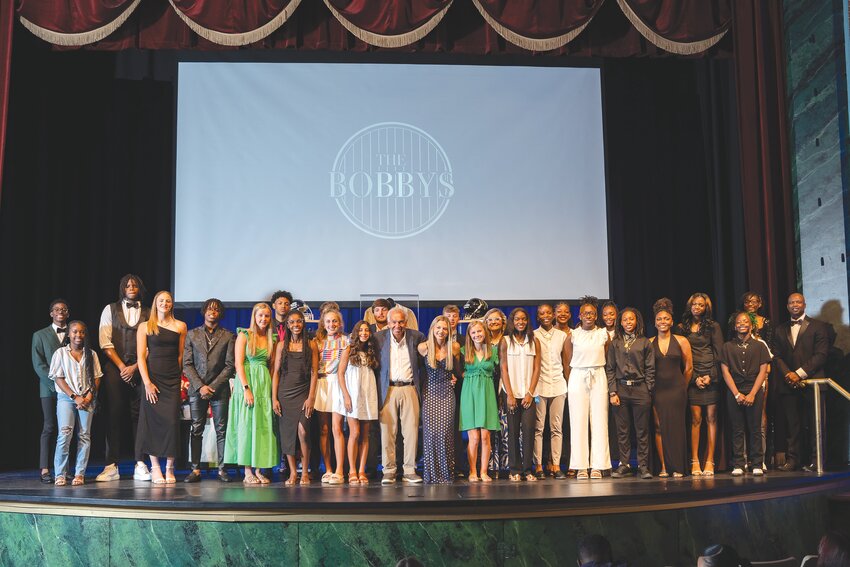 Local high school students from across the tri-county share the stage with Bobby Richardson, center, and Dexter Davis, right, at The Bobbys on Thursday at Sumter Opera House. See more photos on A14 and read more about the annual event on B1.