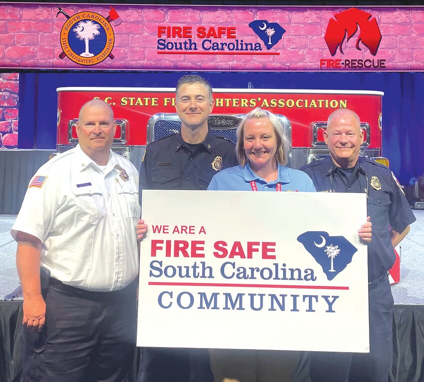 Division Chief Mark Thompson, Capt. Marc Brewer, Lt. April Conyers and Capt. Gill Frierson with Clarendon County Fire Rescue hold the 2023 Fire Safe South Carolina Community designation. CCFR has received the designation annually since the recognition was established in 2019.