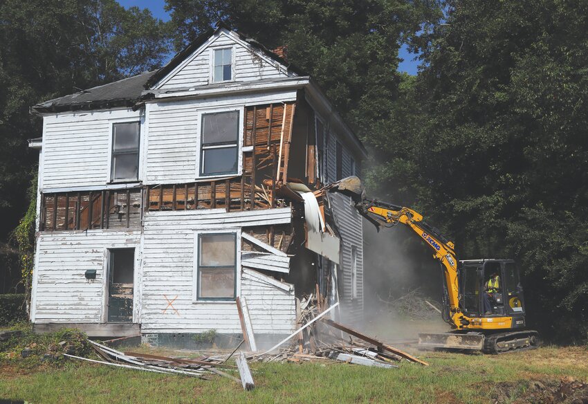 A home at 410 Church St. is demolished on Friday, June 28, made possible by the 2023-24 Community Development Block Grant and the Sumter Pride Program.