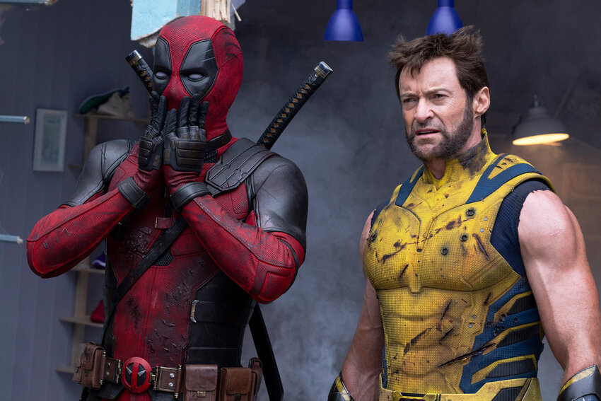 This image released by 20th Century Studios/Marvel Studios shows Ryan Reynolds as Deadpool/Wade Wilson, left, and Hugh Jackman as Wolverine/Logan in a scene from &quot;Deadpool &amp; Wolverine.&quot;