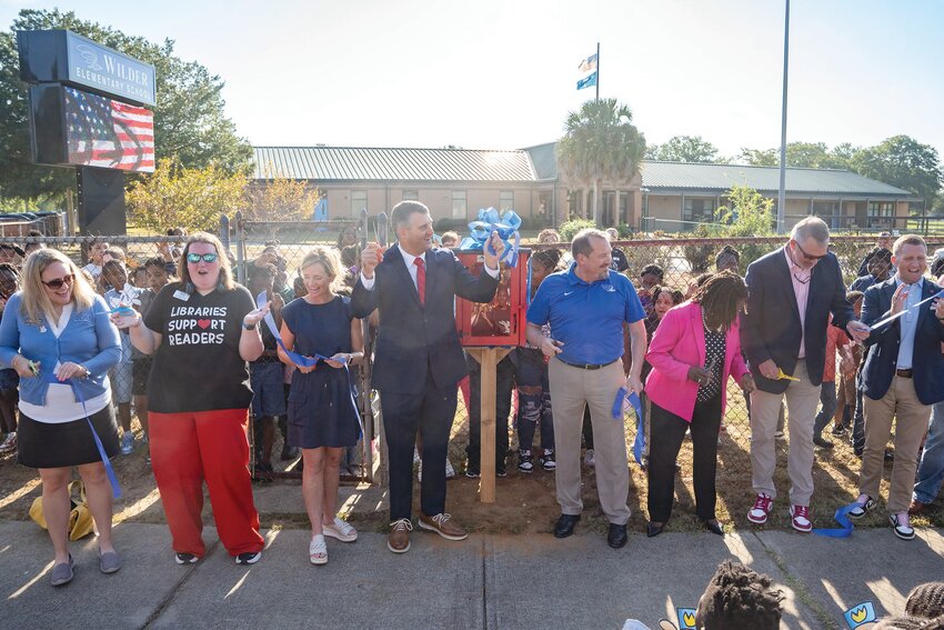 Wilder Elementary School celebrates the opening of its new Little Free Library, as well as a 1,000-book donation to stock the library, on Friday morning, Aug. 30, with the help of City of Sumter and Sumter School District leadership.