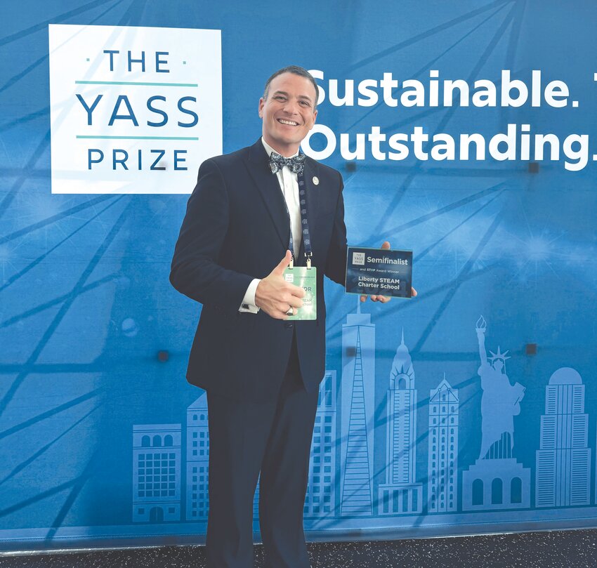 Liberty STEAM Executive Director Trevor Ivey is recognized last week in New York at the Yass Foundation summit in New York.