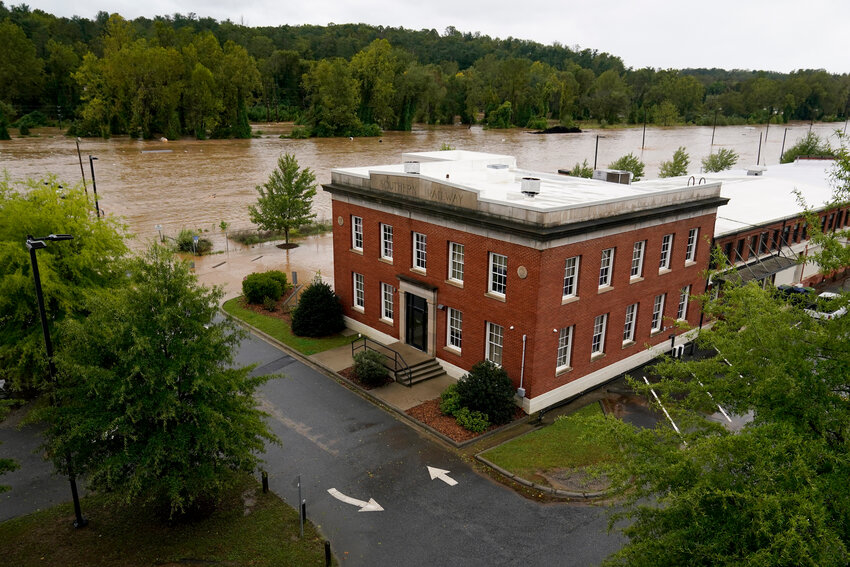 The banks of the Swannanoa river overflow an effect of Hurricane Helene, Friday, Sept. 27, 2024, in Asheville, N.C.