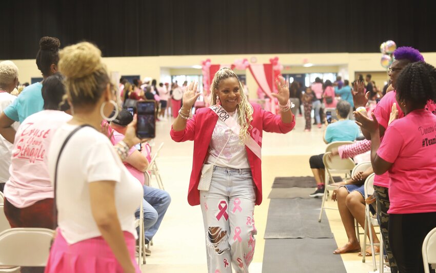 Breast cancer survivors, thrivers and metavivors strut their stuff during the Parade of BREASTies at the 2024 Pink in the City.