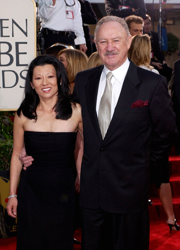 Actor Gene Hackman arrives with his wife, Betsy Arakawa, for the 60th Annual Golden Globe Awards in Beverly Hills, Calif., Sunday, Jan. 19, 2003.