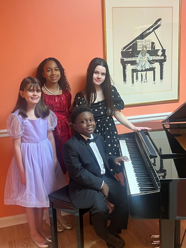 From left, standing, Sumter piano students Katie Hanson, Ananda Bucci and Anna Krueger, and Ethan Geter, seated, along with Lauren Tomlin (not pictured) competed in the South Carolina Piano Festival Auditions on March 1 at the University of South Carolina School of Music in Columbia.