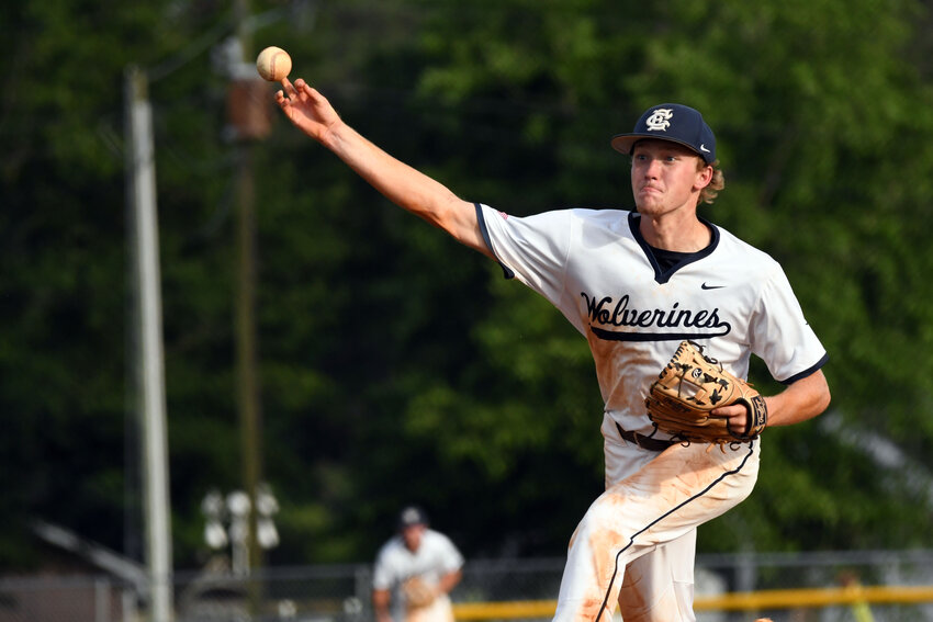 East Clarendon's Foster Matthews delivers against Atlantic Collegiate on Friday.