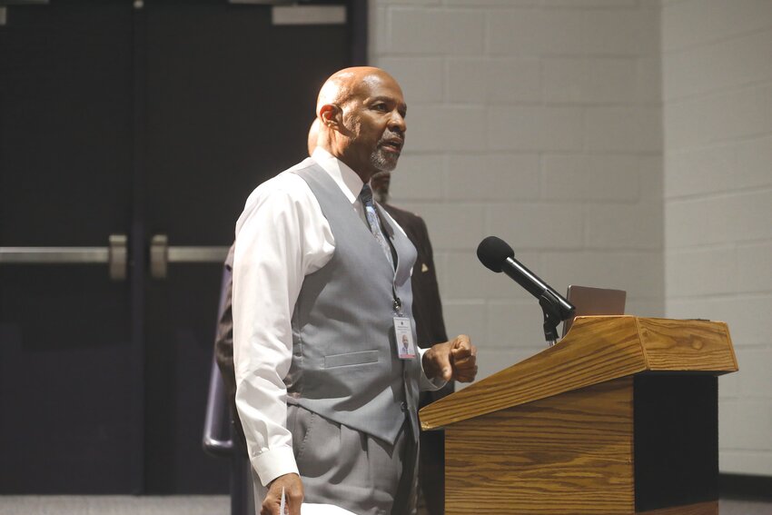 Sumter School District Executive Director of Operations Samuel Myers speaks at Monday's school board meeting on an agenda item at the Crestwood High School Fine Arts Center. On the district's staff, Myers has managed the Crestwood football stadium project.