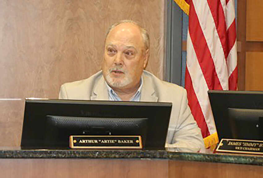 Sumter County Councilman Artie Baker speaks during Tuesday's council meeting to Sumter School District Superintendent William Wright Jr. at county council chambers in downtown Sumter.