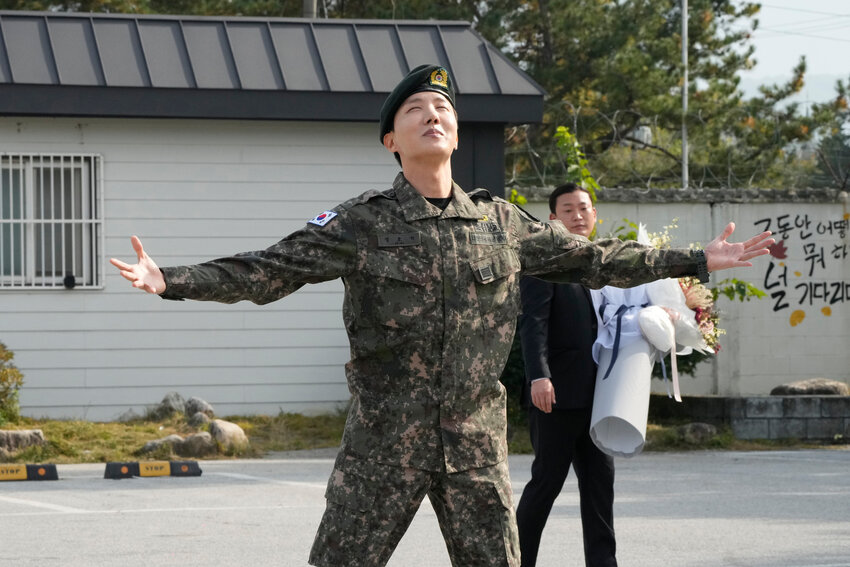 K-pop band BTS's member J-Hope reacts after being discharged from a mandatory military service outside of an army base in Wonju, South Korea, Thursday, Oct. 17, 2024.