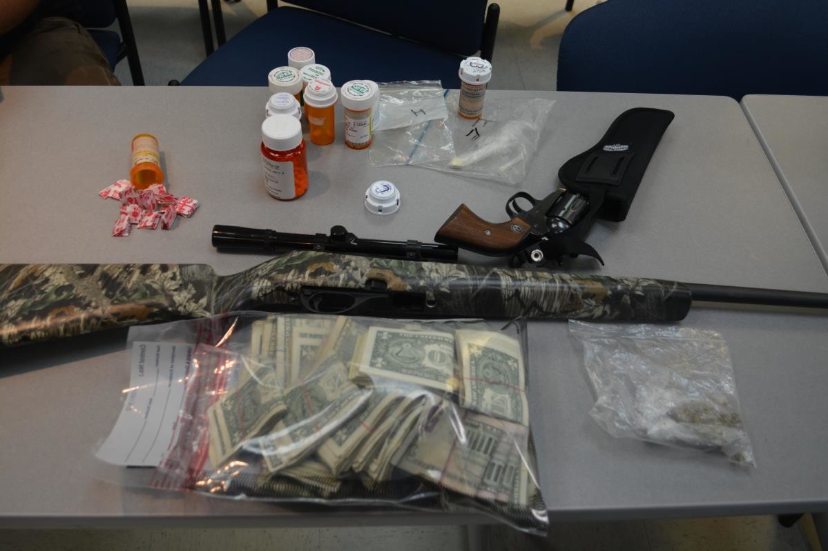 Four people have been arrested after a several months-long investigation of a Jasmine Street residence. Heroin and various other drugs were found at the home when a warrant was served Wednesday morning.